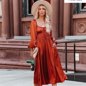 Pines Satin Pocketed Drawstring Dress in color Rust.